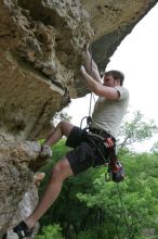 Adam Libson top rope climbing Diving for Rocks (5.10d), photographed from  the third bolt of Magster (5.10a).  It was another long day of rock climbing at Seismic Wall on Austin's Barton Creek Greenbelt, Saturday, April 11, 2009.

Filename: SRM_20090411_16252939.JPG
Aperture: f/5.0
Shutter Speed: 1/400
Body: Canon EOS-1D Mark II
Lens: Canon EF 16-35mm f/2.8 L