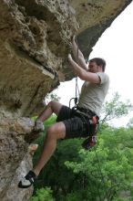 Adam Libson top rope climbing Diving for Rocks (5.10d), photographed from  the third bolt of Magster (5.10a).  It was another long day of rock climbing at Seismic Wall on Austin's Barton Creek Greenbelt, Saturday, April 11, 2009.

Filename: SRM_20090411_16252940.JPG
Aperture: f/5.0
Shutter Speed: 1/400
Body: Canon EOS-1D Mark II
Lens: Canon EF 16-35mm f/2.8 L