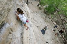 Charlotte Sanders top rope climbing Diving for Rocks (5.10d), photographed from  the third bolt of Magster (5.10a).  It was another long day of rock climbing at Seismic Wall on Austin's Barton Creek Greenbelt, Saturday, April 11, 2009.

Filename: SRM_20090411_16312242.JPG
Aperture: f/5.6
Shutter Speed: 1/320
Body: Canon EOS-1D Mark II
Lens: Canon EF 16-35mm f/2.8 L