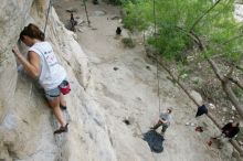 Charlotte Sanders top rope climbing Diving for Rocks (5.10d), photographed from  the third bolt of Magster (5.10a).  It was another long day of rock climbing at Seismic Wall on Austin's Barton Creek Greenbelt, Saturday, April 11, 2009.

Filename: SRM_20090411_16314045.JPG
Aperture: f/5.6
Shutter Speed: 1/320
Body: Canon EOS-1D Mark II
Lens: Canon EF 16-35mm f/2.8 L