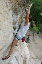 Charlotte Sanders top rope climbing Diving for Rocks (5.10d), photographed from  the third bolt of Magster (5.10a).  It was another long day of rock climbing at Seismic Wall on Austin's Barton Creek Greenbelt, Saturday, April 11, 2009.

Filename: SRM_20090411_16321748.JPG
Aperture: f/5.6
Shutter Speed: 1/320
Body: Canon EOS-1D Mark II
Lens: Canon EF 16-35mm f/2.8 L