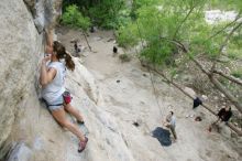 Charlotte Sanders top rope climbing Diving for Rocks (5.10d), photographed from  the third bolt of Magster (5.10a).  It was another long day of rock climbing at Seismic Wall on Austin's Barton Creek Greenbelt, Saturday, April 11, 2009.

Filename: SRM_20090411_16340450.JPG
Aperture: f/5.6
Shutter Speed: 1/320
Body: Canon EOS-1D Mark II
Lens: Canon EF 16-35mm f/2.8 L