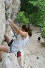 Charlotte Sanders top rope climbing Diving for Rocks (5.10d), photographed from  the third bolt of Magster (5.10a).  It was another long day of rock climbing at Seismic Wall on Austin's Barton Creek Greenbelt, Saturday, April 11, 2009.

Filename: SRM_20090411_16342152.JPG
Aperture: f/5.6
Shutter Speed: 1/320
Body: Canon EOS-1D Mark II
Lens: Canon EF 16-35mm f/2.8 L