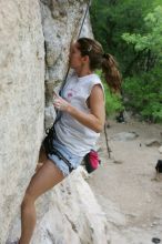 Charlotte Sanders top rope climbing Diving for Rocks (5.10d), photographed from  the third bolt of Magster (5.10a).  It was another long day of rock climbing at Seismic Wall on Austin's Barton Creek Greenbelt, Saturday, April 11, 2009.

Filename: SRM_20090411_16342654.JPG
Aperture: f/5.6
Shutter Speed: 1/320
Body: Canon EOS-1D Mark II
Lens: Canon EF 16-35mm f/2.8 L