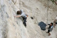 Andrew Dreher top rope climbing Diving for Rocks (5.10d) with Javier Morales belaying, photographed from  the third bolt of Magster (5.10a).  It was another long day of rock climbing at Seismic Wall on Austin's Barton Creek Greenbelt, Saturday, April 11, 2009.

Filename: SRM_20090411_16410668.JPG
Aperture: f/5.6
Shutter Speed: 1/320
Body: Canon EOS-1D Mark II
Lens: Canon EF 16-35mm f/2.8 L