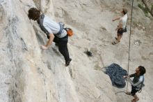 Andrew Dreher top rope climbing Diving for Rocks (5.10d) with Javier Morales belaying, photographed from  the third bolt of Magster (5.10a).  It was another long day of rock climbing at Seismic Wall on Austin's Barton Creek Greenbelt, Saturday, April 11, 2009.

Filename: SRM_20090411_16411070.JPG
Aperture: f/5.6
Shutter Speed: 1/320
Body: Canon EOS-1D Mark II
Lens: Canon EF 16-35mm f/2.8 L