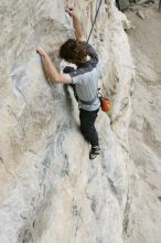 Andrew Dreher top rope climbing Diving for Rocks (5.10d), photographed from  the third bolt of Magster (5.10a).  It was another long day of rock climbing at Seismic Wall on Austin's Barton Creek Greenbelt, Saturday, April 11, 2009.

Filename: SRM_20090411_16414374.JPG
Aperture: f/5.6
Shutter Speed: 1/320
Body: Canon EOS-1D Mark II
Lens: Canon EF 16-35mm f/2.8 L