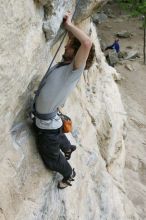 Andrew Dreher top rope climbing Diving for Rocks (5.10d), photographed from  the third bolt of Magster (5.10a).  It was another long day of rock climbing at Seismic Wall on Austin's Barton Creek Greenbelt, Saturday, April 11, 2009.

Filename: SRM_20090411_16415980.JPG
Aperture: f/5.6
Shutter Speed: 1/320
Body: Canon EOS-1D Mark II
Lens: Canon EF 16-35mm f/2.8 L