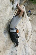 Andrew Dreher top rope climbing Diving for Rocks (5.10d), photographed from  the third bolt of Magster (5.10a).  It was another long day of rock climbing at Seismic Wall on Austin's Barton Creek Greenbelt, Saturday, April 11, 2009.

Filename: SRM_20090411_16415981.JPG
Aperture: f/5.6
Shutter Speed: 1/320
Body: Canon EOS-1D Mark II
Lens: Canon EF 16-35mm f/2.8 L