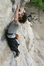 Andrew Dreher top rope climbing Diving for Rocks (5.10d), photographed from  the third bolt of Magster (5.10a).  It was another long day of rock climbing at Seismic Wall on Austin's Barton Creek Greenbelt, Saturday, April 11, 2009.

Filename: SRM_20090411_16420182.JPG
Aperture: f/5.6
Shutter Speed: 1/320
Body: Canon EOS-1D Mark II
Lens: Canon EF 16-35mm f/2.8 L