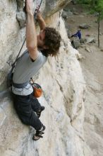 Andrew Dreher top rope climbing Diving for Rocks (5.10d), photographed from  the third bolt of Magster (5.10a).  It was another long day of rock climbing at Seismic Wall on Austin's Barton Creek Greenbelt, Saturday, April 11, 2009.

Filename: SRM_20090411_16420384.JPG
Aperture: f/5.6
Shutter Speed: 1/320
Body: Canon EOS-1D Mark II
Lens: Canon EF 16-35mm f/2.8 L