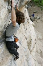 Andrew Dreher top rope climbing Diving for Rocks (5.10d), photographed from  the third bolt of Magster (5.10a).  It was another long day of rock climbing at Seismic Wall on Austin's Barton Creek Greenbelt, Saturday, April 11, 2009.

Filename: SRM_20090411_16420485.JPG
Aperture: f/5.6
Shutter Speed: 1/320
Body: Canon EOS-1D Mark II
Lens: Canon EF 16-35mm f/2.8 L