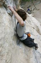 Andrew Dreher top rope climbing Diving for Rocks (5.10d), photographed from  the third bolt of Magster (5.10a).  It was another long day of rock climbing at Seismic Wall on Austin's Barton Creek Greenbelt, Saturday, April 11, 2009.

Filename: SRM_20090411_16421086.JPG
Aperture: f/5.6
Shutter Speed: 1/320
Body: Canon EOS-1D Mark II
Lens: Canon EF 16-35mm f/2.8 L