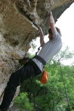 Andrew Dreher top rope climbing Diving for Rocks (5.10d), photographed from  the third bolt of Magster (5.10a).  It was another long day of rock climbing at Seismic Wall on Austin's Barton Creek Greenbelt, Saturday, April 11, 2009.

Filename: SRM_20090411_16425507.JPG
Aperture: f/5.6
Shutter Speed: 1/320
Body: Canon EOS-1D Mark II
Lens: Canon EF 16-35mm f/2.8 L