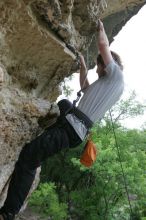 Andrew Dreher top rope climbing Diving for Rocks (5.10d), photographed from  the third bolt of Magster (5.10a).  It was another long day of rock climbing at Seismic Wall on Austin's Barton Creek Greenbelt, Saturday, April 11, 2009.

Filename: SRM_20090411_16425508.JPG
Aperture: f/5.6
Shutter Speed: 1/320
Body: Canon EOS-1D Mark II
Lens: Canon EF 16-35mm f/2.8 L