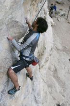 Javier Morales top rope climbing Diving for Rocks (5.10d), photographed from  the third bolt of Magster (5.10a).  It was another long day of rock climbing at Seismic Wall on Austin's Barton Creek Greenbelt, Saturday, April 11, 2009.

Filename: SRM_20090411_16481817.JPG
Aperture: f/5.6
Shutter Speed: 1/320
Body: Canon EOS-1D Mark II
Lens: Canon EF 16-35mm f/2.8 L