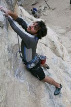 Javier Morales top rope climbing Diving for Rocks (5.10d), photographed from  the third bolt of Magster (5.10a).  It was another long day of rock climbing at Seismic Wall on Austin's Barton Creek Greenbelt, Saturday, April 11, 2009.

Filename: SRM_20090411_16483021.JPG
Aperture: f/5.6
Shutter Speed: 1/320
Body: Canon EOS-1D Mark II
Lens: Canon EF 16-35mm f/2.8 L