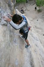 Javier Morales top rope climbing Diving for Rocks (5.10d), photographed from  the third bolt of Magster (5.10a).  It was another long day of rock climbing at Seismic Wall on Austin's Barton Creek Greenbelt, Saturday, April 11, 2009.

Filename: SRM_20090411_16484927.JPG
Aperture: f/5.6
Shutter Speed: 1/320
Body: Canon EOS-1D Mark II
Lens: Canon EF 16-35mm f/2.8 L