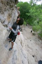 Javier Morales top rope climbing Diving for Rocks (5.10d), photographed from  the third bolt of Magster (5.10a).  It was another long day of rock climbing at Seismic Wall on Austin's Barton Creek Greenbelt, Saturday, April 11, 2009.

Filename: SRM_20090411_16485336.JPG
Aperture: f/5.6
Shutter Speed: 1/320
Body: Canon EOS-1D Mark II
Lens: Canon EF 16-35mm f/2.8 L