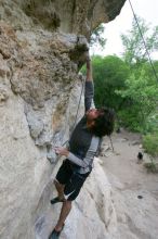 Javier Morales top rope climbing Diving for Rocks (5.10d), photographed from  the third bolt of Magster (5.10a).  It was another long day of rock climbing at Seismic Wall on Austin's Barton Creek Greenbelt, Saturday, April 11, 2009.

Filename: SRM_20090411_16485440.JPG
Aperture: f/5.6
Shutter Speed: 1/320
Body: Canon EOS-1D Mark II
Lens: Canon EF 16-35mm f/2.8 L