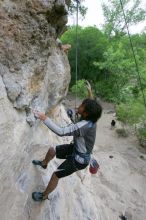 Javier Morales top rope climbing Diving for Rocks (5.10d), photographed from  the third bolt of Magster (5.10a).  It was another long day of rock climbing at Seismic Wall on Austin's Barton Creek Greenbelt, Saturday, April 11, 2009.

Filename: SRM_20090411_16485445.JPG
Aperture: f/5.6
Shutter Speed: 1/320
Body: Canon EOS-1D Mark II
Lens: Canon EF 16-35mm f/2.8 L