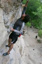 Javier Morales top rope climbing Diving for Rocks (5.10d), photographed from  the third bolt of Magster (5.10a).  It was another long day of rock climbing at Seismic Wall on Austin's Barton Creek Greenbelt, Saturday, April 11, 2009.

Filename: SRM_20090411_16491447.JPG
Aperture: f/5.6
Shutter Speed: 1/320
Body: Canon EOS-1D Mark II
Lens: Canon EF 16-35mm f/2.8 L