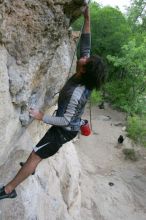 Javier Morales top rope climbing Diving for Rocks (5.10d), photographed from  the third bolt of Magster (5.10a).  It was another long day of rock climbing at Seismic Wall on Austin's Barton Creek Greenbelt, Saturday, April 11, 2009.

Filename: SRM_20090411_16491549.JPG
Aperture: f/5.6
Shutter Speed: 1/320
Body: Canon EOS-1D Mark II
Lens: Canon EF 16-35mm f/2.8 L