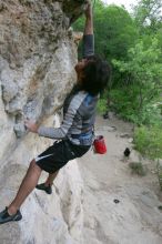 Javier Morales top rope climbing Diving for Rocks (5.10d), photographed from  the third bolt of Magster (5.10a).  It was another long day of rock climbing at Seismic Wall on Austin's Barton Creek Greenbelt, Saturday, April 11, 2009.

Filename: SRM_20090411_16491550.JPG
Aperture: f/5.6
Shutter Speed: 1/320
Body: Canon EOS-1D Mark II
Lens: Canon EF 16-35mm f/2.8 L