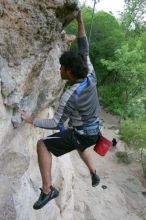 Javier Morales top rope climbing Diving for Rocks (5.10d), photographed from  the third bolt of Magster (5.10a).  It was another long day of rock climbing at Seismic Wall on Austin's Barton Creek Greenbelt, Saturday, April 11, 2009.

Filename: SRM_20090411_16491552.JPG
Aperture: f/5.6
Shutter Speed: 1/320
Body: Canon EOS-1D Mark II
Lens: Canon EF 16-35mm f/2.8 L