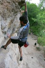 Javier Morales top rope climbing Diving for Rocks (5.10d), photographed from  the third bolt of Magster (5.10a).  It was another long day of rock climbing at Seismic Wall on Austin's Barton Creek Greenbelt, Saturday, April 11, 2009.

Filename: SRM_20090411_16491658.JPG
Aperture: f/5.6
Shutter Speed: 1/320
Body: Canon EOS-1D Mark II
Lens: Canon EF 16-35mm f/2.8 L