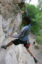 Javier Morales top rope climbing Diving for Rocks (5.10d), photographed from  the third bolt of Magster (5.10a).  It was another long day of rock climbing at Seismic Wall on Austin's Barton Creek Greenbelt, Saturday, April 11, 2009.

Filename: SRM_20090411_16491760.JPG
Aperture: f/5.6
Shutter Speed: 1/320
Body: Canon EOS-1D Mark II
Lens: Canon EF 16-35mm f/2.8 L