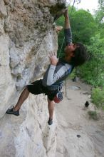 Javier Morales top rope climbing Diving for Rocks (5.10d), photographed from  the third bolt of Magster (5.10a).  It was another long day of rock climbing at Seismic Wall on Austin's Barton Creek Greenbelt, Saturday, April 11, 2009.

Filename: SRM_20090411_16491862.JPG
Aperture: f/5.6
Shutter Speed: 1/320
Body: Canon EOS-1D Mark II
Lens: Canon EF 16-35mm f/2.8 L