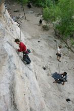 Me top rope climbing Diving for Rocks (5.10d) with Javier Morales belaying, photographed from  the third bolt of Magster (5.10a) by Andrew Dreher.  It was another long day of rock climbing at Seismic Wall on Austin's Barton Creek Greenbelt, Saturday, April 11, 2009.

Filename: SRM_20090411_17024470.JPG
Aperture: f/5.6
Shutter Speed: 1/250
Body: Canon EOS-1D Mark II
Lens: Canon EF 16-35mm f/2.8 L