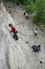 Me top rope climbing Diving for Rocks (5.10d) with Javier Morales belaying, photographed from  the third bolt of Magster (5.10a) by Andrew Dreher.  It was another long day of rock climbing at Seismic Wall on Austin's Barton Creek Greenbelt, Saturday, April 11, 2009.

Filename: SRM_20090411_17024471.JPG
Aperture: f/5.6
Shutter Speed: 1/250
Body: Canon EOS-1D Mark II
Lens: Canon EF 16-35mm f/2.8 L