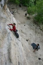 Me top rope climbing Diving for Rocks (5.10d) with Javier Morales belaying, photographed from  the third bolt of Magster (5.10a) by Andrew Dreher.  It was another long day of rock climbing at Seismic Wall on Austin's Barton Creek Greenbelt, Saturday, April 11, 2009.

Filename: SRM_20090411_17031173.JPG
Aperture: f/5.6
Shutter Speed: 1/320
Body: Canon EOS-1D Mark II
Lens: Canon EF 16-35mm f/2.8 L