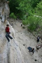 Me top rope climbing Diving for Rocks (5.10d) with Javier Morales belaying, photographed from  the third bolt of Magster (5.10a) by Andrew Dreher.  It was another long day of rock climbing at Seismic Wall on Austin's Barton Creek Greenbelt, Saturday, April 11, 2009.

Filename: SRM_20090411_17035776.JPG
Aperture: f/5.6
Shutter Speed: 1/320
Body: Canon EOS-1D Mark II
Lens: Canon EF 16-35mm f/2.8 L