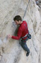 Me top rope climbing Diving for Rocks (5.10d), photographed from  the third bolt of Magster (5.10a) by Andrew Dreher.  It was another long day of rock climbing at Seismic Wall on Austin's Barton Creek Greenbelt, Saturday, April 11, 2009.

Filename: SRM_20090411_17041579.JPG
Aperture: f/5.6
Shutter Speed: 1/320
Body: Canon EOS-1D Mark II
Lens: Canon EF 16-35mm f/2.8 L