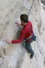 Me top rope climbing Diving for Rocks (5.10d), photographed from  the third bolt of Magster (5.10a) by Andrew Dreher.  It was another long day of rock climbing at Seismic Wall on Austin's Barton Creek Greenbelt, Saturday, April 11, 2009.

Filename: SRM_20090411_17041780.JPG
Aperture: f/5.6
Shutter Speed: 1/320
Body: Canon EOS-1D Mark II
Lens: Canon EF 16-35mm f/2.8 L