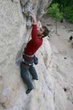 Me top rope climbing Diving for Rocks (5.10d), photographed from  the third bolt of Magster (5.10a) by Andrew Dreher.  It was another long day of rock climbing at Seismic Wall on Austin's Barton Creek Greenbelt, Saturday, April 11, 2009.

Filename: SRM_20090411_17043484.JPG
Aperture: f/5.6
Shutter Speed: 1/320
Body: Canon EOS-1D Mark II
Lens: Canon EF 16-35mm f/2.8 L