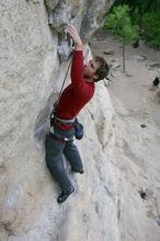 Me top rope climbing Diving for Rocks (5.10d), photographed from  the third bolt of Magster (5.10a) by Andrew Dreher.  It was another long day of rock climbing at Seismic Wall on Austin's Barton Creek Greenbelt, Saturday, April 11, 2009.

Filename: SRM_20090411_17043485.JPG
Aperture: f/5.6
Shutter Speed: 1/320
Body: Canon EOS-1D Mark II
Lens: Canon EF 16-35mm f/2.8 L