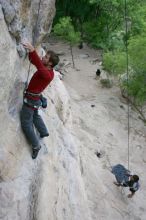 Me top rope climbing Diving for Rocks (5.10d) with Javier Morales belaying, photographed from  the third bolt of Magster (5.10a) by Andrew Dreher.  It was another long day of rock climbing at Seismic Wall on Austin's Barton Creek Greenbelt, Saturday, April 11, 2009.

Filename: SRM_20090411_17044888.JPG
Aperture: f/5.6
Shutter Speed: 1/320
Body: Canon EOS-1D Mark II
Lens: Canon EF 16-35mm f/2.8 L