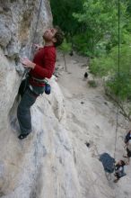 Me top rope climbing Diving for Rocks (5.10d) with Javier Morales belaying, photographed from  the third bolt of Magster (5.10a) by Andrew Dreher.  It was another long day of rock climbing at Seismic Wall on Austin's Barton Creek Greenbelt, Saturday, April 11, 2009.

Filename: SRM_20090411_17051092.JPG
Aperture: f/5.6
Shutter Speed: 1/320
Body: Canon EOS-1D Mark II
Lens: Canon EF 16-35mm f/2.8 L