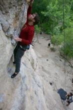 Me top rope climbing Diving for Rocks (5.10d) with Javier Morales belaying, photographed from  the third bolt of Magster (5.10a) by Andrew Dreher.  It was another long day of rock climbing at Seismic Wall on Austin's Barton Creek Greenbelt, Saturday, April 11, 2009.

Filename: SRM_20090411_17051093.JPG
Aperture: f/5.6
Shutter Speed: 1/320
Body: Canon EOS-1D Mark II
Lens: Canon EF 16-35mm f/2.8 L