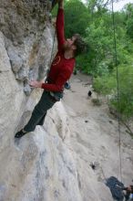 Me top rope climbing Diving for Rocks (5.10d) with Javier Morales belaying, photographed from  the third bolt of Magster (5.10a) by Andrew Dreher.  It was another long day of rock climbing at Seismic Wall on Austin's Barton Creek Greenbelt, Saturday, April 11, 2009.

Filename: SRM_20090411_17051195.JPG
Aperture: f/5.6
Shutter Speed: 1/320
Body: Canon EOS-1D Mark II
Lens: Canon EF 16-35mm f/2.8 L