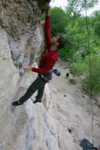 Me top rope climbing Diving for Rocks (5.10d), photographed from  the third bolt of Magster (5.10a) by Andrew Dreher.  It was another long day of rock climbing at Seismic Wall on Austin's Barton Creek Greenbelt, Saturday, April 11, 2009.

Filename: SRM_20090411_17051196.JPG
Aperture: f/5.6
Shutter Speed: 1/320
Body: Canon EOS-1D Mark II
Lens: Canon EF 16-35mm f/2.8 L