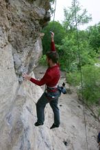 Me top rope climbing Diving for Rocks (5.10d), photographed from  the third bolt of Magster (5.10a) by Andrew Dreher.  It was another long day of rock climbing at Seismic Wall on Austin's Barton Creek Greenbelt, Saturday, April 11, 2009.

Filename: SRM_20090411_17051199.JPG
Aperture: f/5.6
Shutter Speed: 1/320
Body: Canon EOS-1D Mark II
Lens: Canon EF 16-35mm f/2.8 L