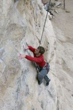 Me top rope climbing Diving for Rocks (5.10d), photographed from  the third bolt of Magster (5.10a) by Andrew Dreher.  It was another long day of rock climbing at Seismic Wall on Austin's Barton Creek Greenbelt, Saturday, April 11, 2009.

Filename: SRM_20090411_17065206.JPG
Aperture: f/5.6
Shutter Speed: 1/320
Body: Canon EOS-1D Mark II
Lens: Canon EF 16-35mm f/2.8 L