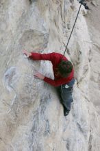 Me top rope climbing Diving for Rocks (5.10d), photographed from  the third bolt of Magster (5.10a) by Andrew Dreher.  It was another long day of rock climbing at Seismic Wall on Austin's Barton Creek Greenbelt, Saturday, April 11, 2009.

Filename: SRM_20090411_17070608.JPG
Aperture: f/5.6
Shutter Speed: 1/320
Body: Canon EOS-1D Mark II
Lens: Canon EF 16-35mm f/2.8 L