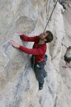 Me top rope climbing Diving for Rocks (5.10d), photographed from  the third bolt of Magster (5.10a) by Andrew Dreher.  It was another long day of rock climbing at Seismic Wall on Austin's Barton Creek Greenbelt, Saturday, April 11, 2009.

Filename: SRM_20090411_17071310.JPG
Aperture: f/5.6
Shutter Speed: 1/320
Body: Canon EOS-1D Mark II
Lens: Canon EF 16-35mm f/2.8 L