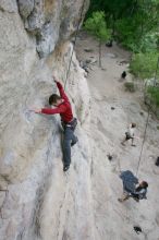 Me top rope climbing Diving for Rocks (5.10d) with Javier Morales belaying, photographed from  the third bolt of Magster (5.10a) by Andrew Dreher.  It was another long day of rock climbing at Seismic Wall on Austin's Barton Creek Greenbelt, Saturday, April 11, 2009.

Filename: SRM_20090411_17071812.JPG
Aperture: f/5.6
Shutter Speed: 1/320
Body: Canon EOS-1D Mark II
Lens: Canon EF 16-35mm f/2.8 L